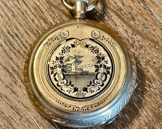 14k gold pocket watch, runs great ( please do not call for specifics, just come to the sale)