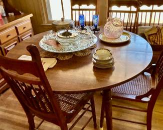This table has a extra leaf so it can be an oval shape if desired