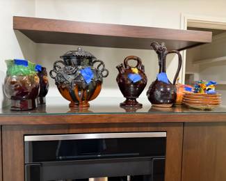 Lots of treakle pottery and jugs