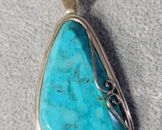 Large turquoise pendant.