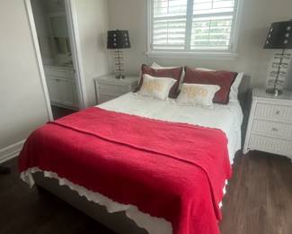 Queen bed w/black and white checkered fabric headboard (see next photo)