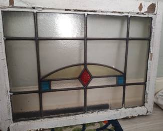 Stained glass window pane - blue, red & yellow arch panel