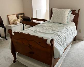 Twin bed with matress and boxspring and trundle under the bed $225
