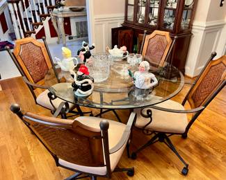 Glass top table and 4 chairs - we have 2 sets -$275 each