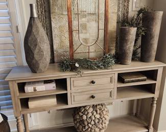 Beige console with contemporary decor
