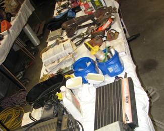 Tables full of parts, pieces and items