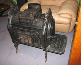 Unusual wood stove with side and front door