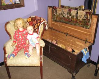 Arm chair, dolls, rough cedar chest