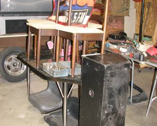 Table, chairs, subwoofer box, riding mower seats