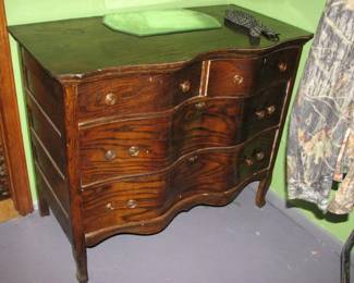 Serpentine front dresser
