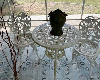 Very heavy iron table and 2 chairs
Garden set
Excellent condition