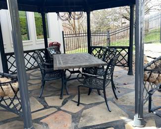 Large stone topped table with 6 chairs