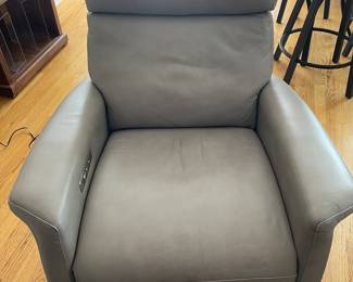 Beautiful leather motorize recliner. Retail price $5,000 per chair. Annie’s price is to sell