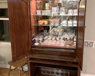 This is an Ethan Allen cabinet.  Here it is used for crystal and glasses, but you can use it for anything you want.