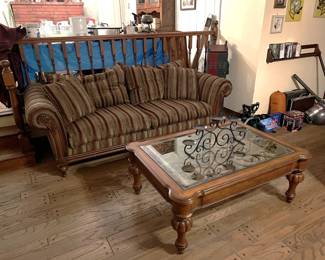 This is a better picture of the coffee table next to the sofa.  Yes, that is a glass top.