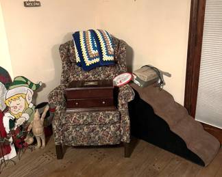 This chair was seen a bit in a different photo.  The ramp-like item could be good for a short pet to get up to your lap.  The box on the chair is a large jewelry box.