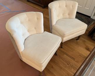 Here are a pair of matching white chairs that could be yours.