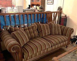 Here is another picture of the sofa, and you can see a corner of the coffee table.  In the background, a china cabinet is available.  More on that piece later.
