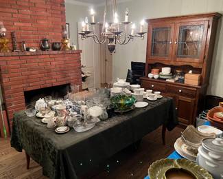 Here is a photo of the kitchen dishware and serving pieces.  You can also see the country-style china cabinet much better now, too.