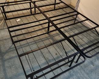 Spotless Queen mattress on folding metal frame. Made in 2023