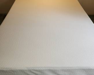 Spotless Queen mattress on folding metal frame. Made in 2023