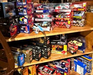 Assorted vintage racing cars and airplanes
