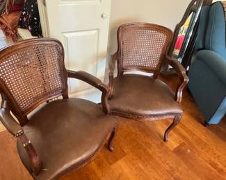 2 matching Cane Back office brown leather Chairs