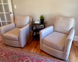 there are 4 matching swivel chairs