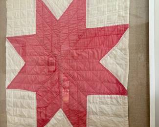 Vintage quilt in a shadow box frame