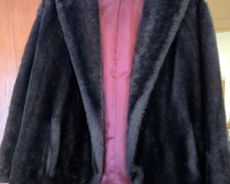 #165	fake fur jacket size medium	 $60.00