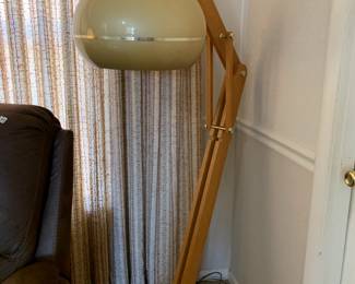 #41	midcentury look floor lamp with tan plastic globe 62 inch tall 	 $75.00