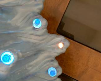 #61	Blue porcelain Christmas tree 2 piece lighted as is missing 1 light 20 tall 	 $100.00