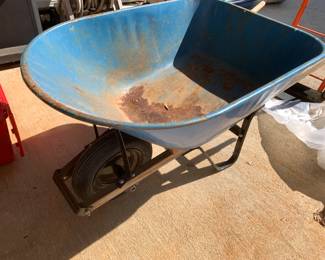 #124	blue metal large wheelbarrow 	 $30.00