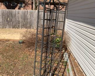 #142	black iron folding 6 foot arbor 	 $40.00