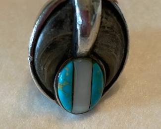 Fabulous men's sterling Native American ring with turquoise and pair of bear claws.  This is certainly a vintage piece and it is very heavy.