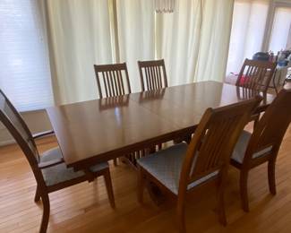 Nice dining room table and 6 chairs that would blend well with any decor