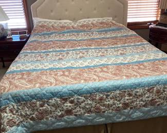 Nice queen bed with clean mattress - fabric headboard.