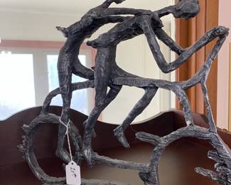 Interesting sculpture of couple on bicycle