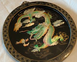 Ornate dragon decorative plate .