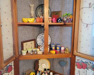 Salt & pepper shakers. (Corner cabinet not for sale)