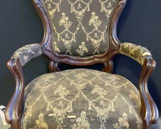 Antique Upholstered Parlor Chair On Casters
