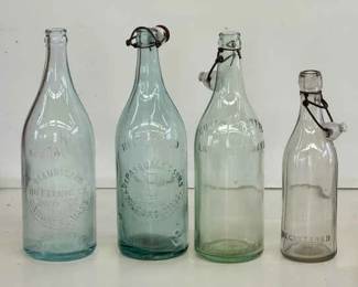 (4) Tall Capped Bottles
