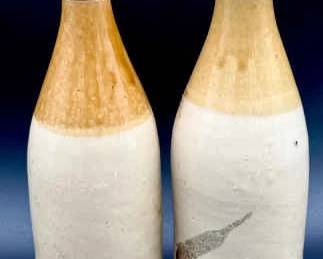 (2) Stamped Vintage Stoneware Bottles
One says "H. Kennedy Pottery Glasgow" 
The other says "Crosveror Glasgow"