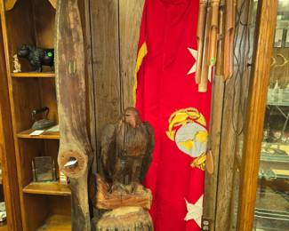 Chainsaw cut eagle, antique wood propeller, Marine flag