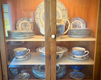 Drexel MCM china cabinet c. 1960. Lighted top with glass doors. Bottom has pullout shelf and drawers and cupboard.