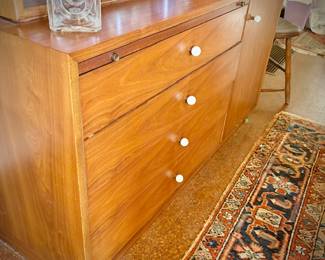 Drexel MCM china cabinet c. 1960. Lighted top with glass doors. Bottom has pullout shelf and drawers and cupboard.
