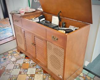 Mid-century Fisher "The Fisher Anniversary Series" console stereo with turntable. Note that Koss components have been added.