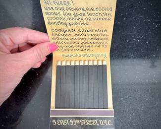 Vintage matchboxes, including this oversized matchbook from the NYC Stork Club, mid 1950s