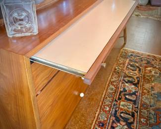 Drexel MCM china cabinet c. 1960. Lighted top with glass doors. Bottom has pullout shelf and drawers and cupboard.