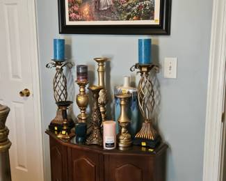 Various sizes of candle sticks 